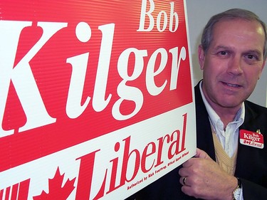Bob Kilger poses with one of his election signs during the election campaign on Nov. 17, 2000.
Cornwall Standard-Freeholder file photo