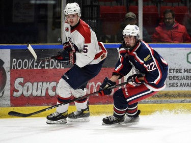 Cornwall Colts Cuyler Molinaro (No. 22) and Ottawa Jr. Senators Wil Murphy during play on Thursday November 18, 2021 in Cornwall, Ont. The Colts lost 5-2. Robert Lefebvre/Special to the Cornwall Standard-Freeholder/Postmedia Network