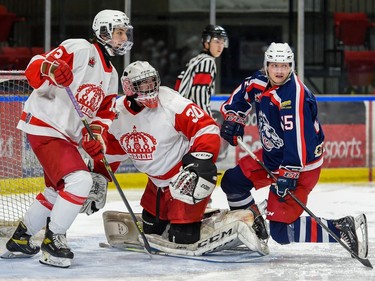 Pembroke Lumber Kings goaltender Dalton McBride, along with teammate Vincent Gasquez and Cornwall Colts Jonathan Heise, all looking for the puck during play on Thursday November 25, 2021 in Cornwall, Ont. Cornwall lost 5-4 in the shootout. Robert Lefebvre/Special to the Cornwall Standard-Freeholder/Postmedia Network