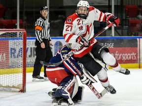 Nepean Raiders Anthony Rivard flies past Cornwall Colts goaltender Dax Easter during play on Thursday November 11, 2021 in Cornwall, Ont. Cornwall lost 8-6. Robert Lefebvre/Special to the Cornwall Standard-Freeholder/Postmedia Network