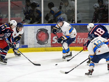Renfrew Wolves Mason Goldie (No. 12), seems best-positioned to grab that puck during play against the Cornwall Colts on Thursday November 4, 2021 in Cornwall, Ont. Cornwall lost 6-2. Robert Lefebvre/Special to the Cornwall Standard-Freeholder/Postmedia Network