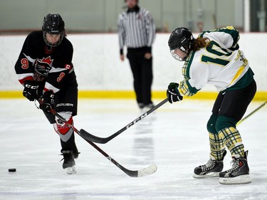 A Glengarry Highlanders U18 player shoots the puck past a Nepean Wildcats player during tournament play on Saturday November 13, 2021 in Cornwall, Ont. Glengarry won 4-1. Robert Lefebvre/Special to the Cornwall Standard-Freeholder/Postmedia Network