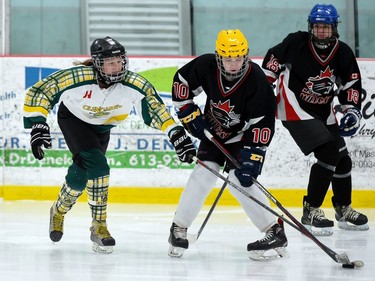 A Glengarry Highlanders U18 player and Nepean Wildcats player battle for the puck during tournament play on Saturday November 13, 2021 in Cornwall, Ont. Glengarry won 4-1. Robert Lefebvre/Special to the Cornwall Standard-Freeholder/Postmedia Network