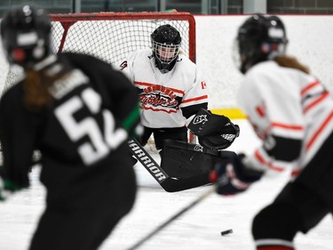 Cornwall Typhoons U18 goaltender Amber Jette keeps an eye on the puck coming towards her during play against Gloucester Cumberland Shooting Stars on Saturday November 13, 2021 in Cornwall, Ont. The game ended in a 0-0 tie. Robert Lefebvre/Special to the Cornwall Standard-Freeholder/Postmedia Network