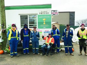 The Devon Recycle Depot team celebrates the ARMA 2021 Collection Site Authority award. (L-r) Marc Etherington, Shawn Burton, Derek Rogers, Ken Fisher, Jonathon Burgess, Michael Donovan and Jared Sewapegaham. (Supplied by Bill White)