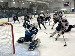 Fort McMurray defenseman Brendan Wang carries the puck to the Camrose net on Saturday, November 6, 2021. Marie Conboy