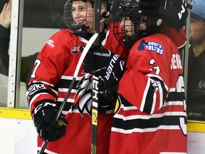 Carter Lewis (7) and Mark Cassidy celebrate Cassidy's second period goal - his second of the game - in a 6-2 win over the visiting Walkerton Hawks in PJHL Pollock division action Nov. 20. Tyson Hall also scored twice while Charlie Rankin and Sean Chisholm also found the net while Lewis added four assists. Mitchell hosts Kincardine Nov. 28 at 3:30 p.m. ANDY BADER/MITCHELL ADVOCATE