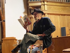 John Gardiner reads from his book, My Lefthanded, Backwards, Upsidedown Life & Assorted Short Stories, during a book launch event at Saugeen Academy on Nov. 13.