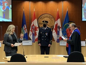 Grande Prairie Mayor Jackie Clayton is sworn in by Justice Morris Golden at City Hall on Oct. 25, 2021.