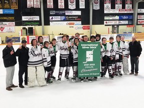 The Dresden U18 Jr. Kings White celebrate their championship win at an International Silver Stick regional tournament in Exeter, Ont., on Sunday, Nov. 21, 2021. The Jr. Kings are, left: coach Mitch Ross, trainer JP Lucier, Maddux Stewart, Max Lucier, Marty Elliott, Brody VanMiddlekoop, Brayden Tremblay, Connor Ross, Williem Seguin, Jackson Ross, Kohen Cudney, Alex Wallace, Ahmed Zafar, Dylan Badder, Ryan Brophy, Jake Bellamy, Colton Noah, Cody Moulton and head coach Dan Wallace. (Contributed Photo)