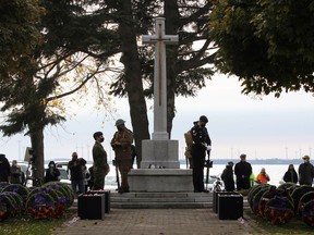 Members of Princess of Wales' Own Regiment stand guard at the cenotaph vigil during the Remembrance Day civic ceremony at the Cross of Sacrifice in Macdonald Park in Kingston on Thursday.