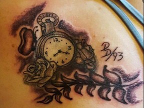 One of several cherished tattoos, "Phoenix's" lovely clock artwork on her shoulder celebrates the birth of her beloved son.