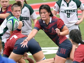 Annie Kennedy, a fly-half on the Acadia Axewomen rugby team, plays in a game against the UPEI Panthers during the 2021 Atlantic University Athletics season.