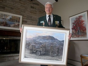 Heritage artist James Keirstead shows his latest Korean War painting at his Glenburnie home and gallery on Monday. The painting was purchased by the Canadian War Museum in Ottawa.