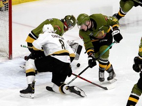 Kingston Frontenacs' Martin Chromiak can't get the puck in front of North Bay Battalion goaltender Joe Vrbetic and defenceman Ty Nelson during Ontario Hockey League action at the Leon's Centre in Kingston on Friday, Nov. 26, 2021. Ian MacAlpine/The Kingston Whig-Standard/Postmedia Network