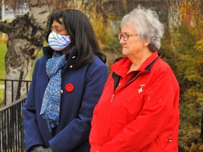 Leslyn Lewis, left, MP for Haldimand-Norfolk, has responded to critics who say her messaging on COVID-19 isn’t helpful at this time of pandemic. Here, Lewis is seen at last week’s Remembrance Day observance in Simcoe with Judy Klages of Woodstock, who placed the wreath at the Norfolk War Memorial on behalf of Silver Cross mothers. – Monte Sonnenberg