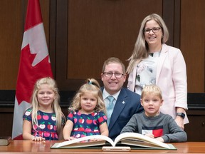 John Nater, of Mitchell, was officially sworn in Oct. 26 as the MP for Perth-Wellington in Canada's 44th Parliament in Ottawa. He later posed for an official photo with wife Justine and children Ainsley (left), Caroline and Bennett. The House of Commons is scheduled to resume on Nov. 22. MATHIEU GIRARD