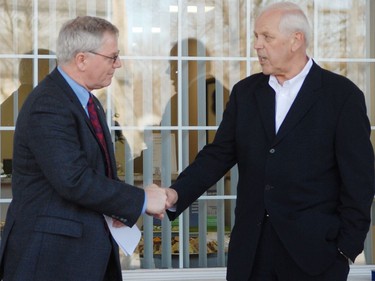 MPP Jim McDonell, shakes the hand of Mayor Bob Kilger at McDonell's new constituency office located at 120 Second St. West during the grand opening celebration on Friday, March 23,2012. ERIKA GLASBERG/CORNWALL STANDARD-FREEHOLDER/QMI AGENCY