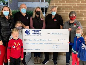 The Optimist Club of Mitchell's Spooktacular event raised $7,221.90, all of which was donated to the primary playground fundraiser at Upper Thames elementary school (UTES). On hand for the presentation were Juanita Belfour (back row, left), Optimist Co-President; Wayne Krug, Spooktacular chair; Justine Nater, playground committee; Bert Vorstenbosch and Sherri Jordan, Optimist Co-President. Front row (left): UTES students Bennett Nater, Alayna Terpstra, Ainsley Nater and Everett Douglas. SUBMITTED