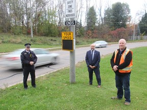 The City of Pembroke has a new, portable, very compact radar device and is partnering with the OPP to share its data, allowing the police to more strategically allocate resources to trouble speeding spots. In the photo from left, Inspector Stephan Neufeld, deputy mayor and Pembroke Police Services Board chairman Ron Gervais, and Brad Faught, Roads and Fleet supervisor.