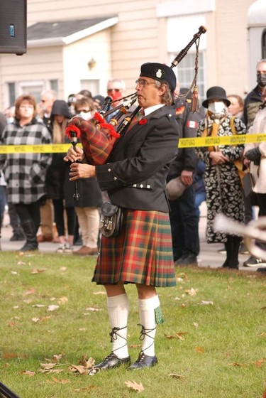 Pipe Major Randy Briand plays the lament during Remembrance Day ceremonies held in Pembroke at the cenotaph on Nov. 11. Anthony Dixon