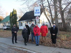 The first established neighbourhood of the Pembroke Community Watch Program is in the Chamberlain Street area of the city. Gathered here for a photo with one of the new signs is, from left, Upper Ottawa Valley OPP detachment commander Inspector Stefan Neufeld, block captains Debbie Andrews, Gary Smith, Steve Halpenny, Sandra Halpenny, and the programs co-chairmen Councillor Brian Abdallah and Pembroke Police Services Board chairman, Deputy Mayor Ron Gervais. Anthony Dixon