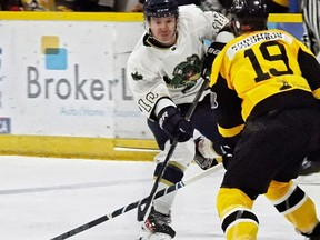 Stratford Fighting Irish forward Maverick Petrie fires a shot at the Tillsonburg net Saturday at Allman Arena. Stratford won 4-1.