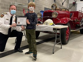 St. Marys Fire Department Chief Richard Anderson welcomed a new co-worker for the day, six-year-old Finn Reid,  who won this year’s Fire Prevention Week colouring contest.