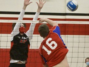 St. Marys DCVI player RJ Martin gets up for a block against Central Huron in the senior boys' volleyball single-A semifinal Tuesday. St. Marys won in straight sets.
