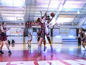 AU WOMEN'S HOOPS: Megan Looney of Algoma University Thunderbirds drives to the net in recent Ontario University Athletics women's basketball action against McMaster University. AU came up on the short end of the score despite 18 points from Looney. BOB DAVIES/SAULT THIS WEEK