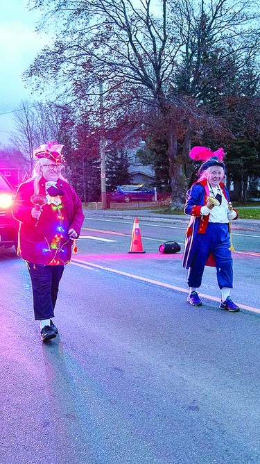 The Town Criers, Caroline Dukes and Mary Rossiter lead the parade up Queen Street.