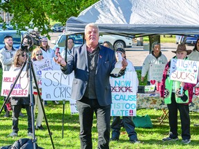 ACTION ON ADDICTIONS SOUGHT: Robert Peace addresses a crowd of about 75 people last week at a peaceful protest on the front lawn of the Civic Centre. The protest was organized by Donna DeSimon, founding member of the Addictions and Mental Health Advocates group. DeSimon organized the rally on her Facebook page, "No More Promises! WE WANT ACTION!!!", in an effort to persuade city council to put more funding into the overdose, mental illness and homeless situation the community currently faces. BOB DAVIES/FOR SAULT THIS WEEK
