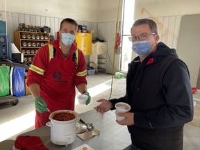 Darcy Vink, Shell Canada United Way committee member, serves chili to Jeff Maclean as part of the United Way employee campaign at Shell. Shell Canada will match all employee and retiree donations until Nov. 19. The overall United Way campaign reached 50 per cent of its $1.75-million goal. Sarnia-Lambton residents can donate to the United Way online at www.theunitedway.on.ca or by calling 519 336-5452. United Way photo
