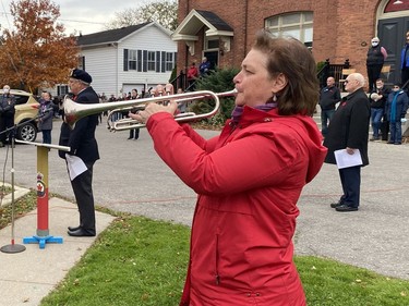 Janet Dickson, a teacher at Waterford District High School, played The Last Post during the Waterford Remembrance Day ceremony on Thursday. KIM NOVAK PHOTO