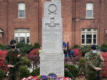 Thomas Oldham, left, and Nicholas Maletta, members of the 69th Battery of the 56th Field Regiment, stand sentry at the Waterford Remembrance Day service on Thursday. KIM NOVAK