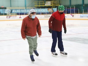 Norm Glaude, left, and Michel Rainville go for a skate during adult public skating at the Gerry McCrory Countryside Sports Complex in Sudbury, Ont. on Tuesday November 2, 2021. Adult public skating is offered at Countryside on Monday, Tuesday, Wednesday and Friday from 11 a.m. to noon. Preregistration is required by visiting greatersudbury.ca/play/arenas/public-skating/adult-public-skating/. John Lappa/Sudbury Star/Postmedia Network