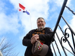 David Clifford, of Sudbury, Ont., has collected more than 100 flags over the last 20 years. John Lappa/Sudbury Star/Postmedia Network
