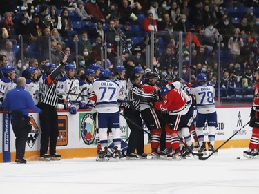 Players from the Sudbury Wolves and Niagara IceDogs scuffle in front of the Wolves bench during OHL action at the Sudbury Community Arena in Sudbury, Ont. on Friday November 5, 2021. John Lappa/Sudbury Star/Postmedia Network