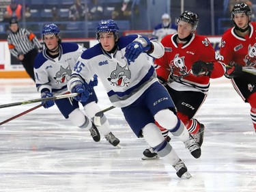 Ethan Larmand, of the Sudbury Wolves, chases down the puck during OHL action against the Niagara IceDogs at the Sudbury Community Arena in Sudbury, Ont. on Friday November 5, 2021. John Lappa/Sudbury Star/Postmedia Network