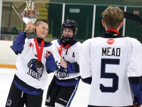 Members of the  Nickel City Sons celebrate after defeating the  North Central Predators during Big Nickel Hockey Tournament U12 Final action on Sunday afternoon. Nickel City Sons defeated the  North Central Predators
5-2. Gino Donato/For The Sudbury Star