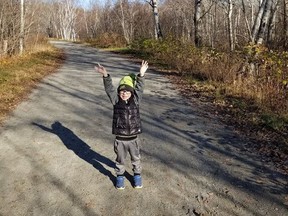 Jesse Rosato's son enjoys the trails in the LU green space. Rosato is working to preserve Laurentian's green space. Supplied