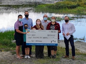 Michel Carré (Weaver Simmons) and son Carter Carré, Jean-François Démoré (Innova Wealth) and Jean-Paul Rains (Rains Media) are among those to take part in a recent donation ceremony.