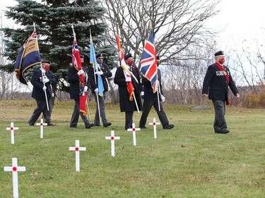 Sergeant-at-Arms Fred Medynski leads a colour party at a Remembrance Day service at Branch 76 of the Royal Canadian Legion in Sudbury, Ont. on Thursday November 11, 2021. John Lappa/Sudbury Star/Postmedia Network