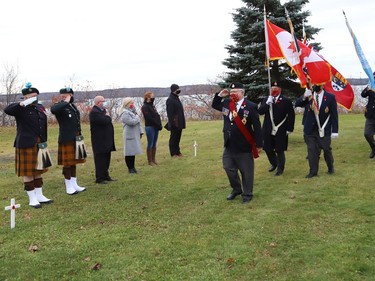Sergeant-at-Arms Fred Medynski leads a colour party during a March Past at a Remembrance Day service at Branch 76 of the Royal Canadian Legion in Sudbury, Ont. on Thursday November 11, 2021. John Lappa/Sudbury Star/Postmedia Network