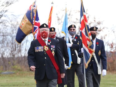 Sergeant-at-Arms Fred Medynski leads a colour party at a Remembrance Day service at Branch 76 of the Royal Canadian Legion in Sudbury, Ont. on Thursday November 11, 2021. John Lappa/Sudbury Star/Postmedia Network