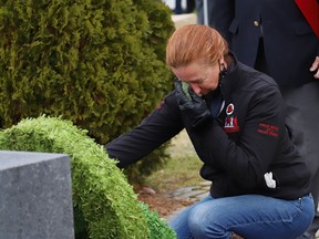 Silver Cross Mother Wendy Miller becomes emotional after laying a wreath at a Remembrance Day service at Branch 76 of the Royal Canadian Legion in Sudbury, Ont. on Thursday November 11, 2021. John Lappa/Sudbury Star/Postmedia Network