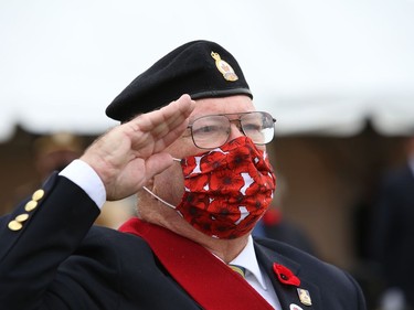 Sergeant-at-Arms Fred Medynski salutes during a Remembrance Day service at Branch 76 of the Royal Canadian Legion in Sudbury, Ont. on Thursday November 11, 2021. John Lappa/Sudbury Star/Postmedia Network