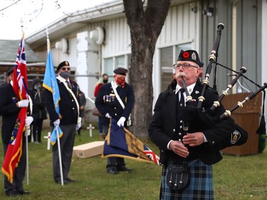 Piper Dave Linney performs the Lament at a Remembrance Day service at Branch 76 of the Royal Canadian Legion in Sudbury, Ont. on Thursday November 11, 2021. John Lappa/Sudbury Star/Postmedia Network