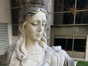 The statue of Mary and Jesus outside Ste. Anne des Pins in downtown Sudbury has again been desecrated. Church officials say they are looking into repairing or replacing the monument but nothing will done until spring. Jim Moodie/Sudbury Star
