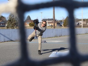 Bill Nickolau works on his shot at an outdoor rink in Coniston, Ont. on Tuesday November 23, 2021. John Lappa/Sudbury Star/Postmedia Network